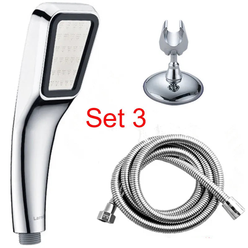 Orange hand-held pressurised shower unit with hose, showing rain shower head and control button.