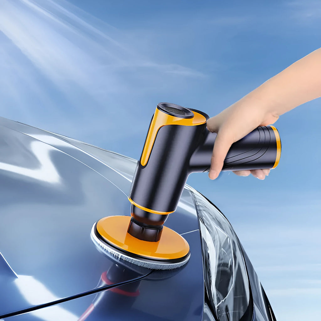 Black car polishing machine with 12cm disc and USB charging cable on a workshop bench
