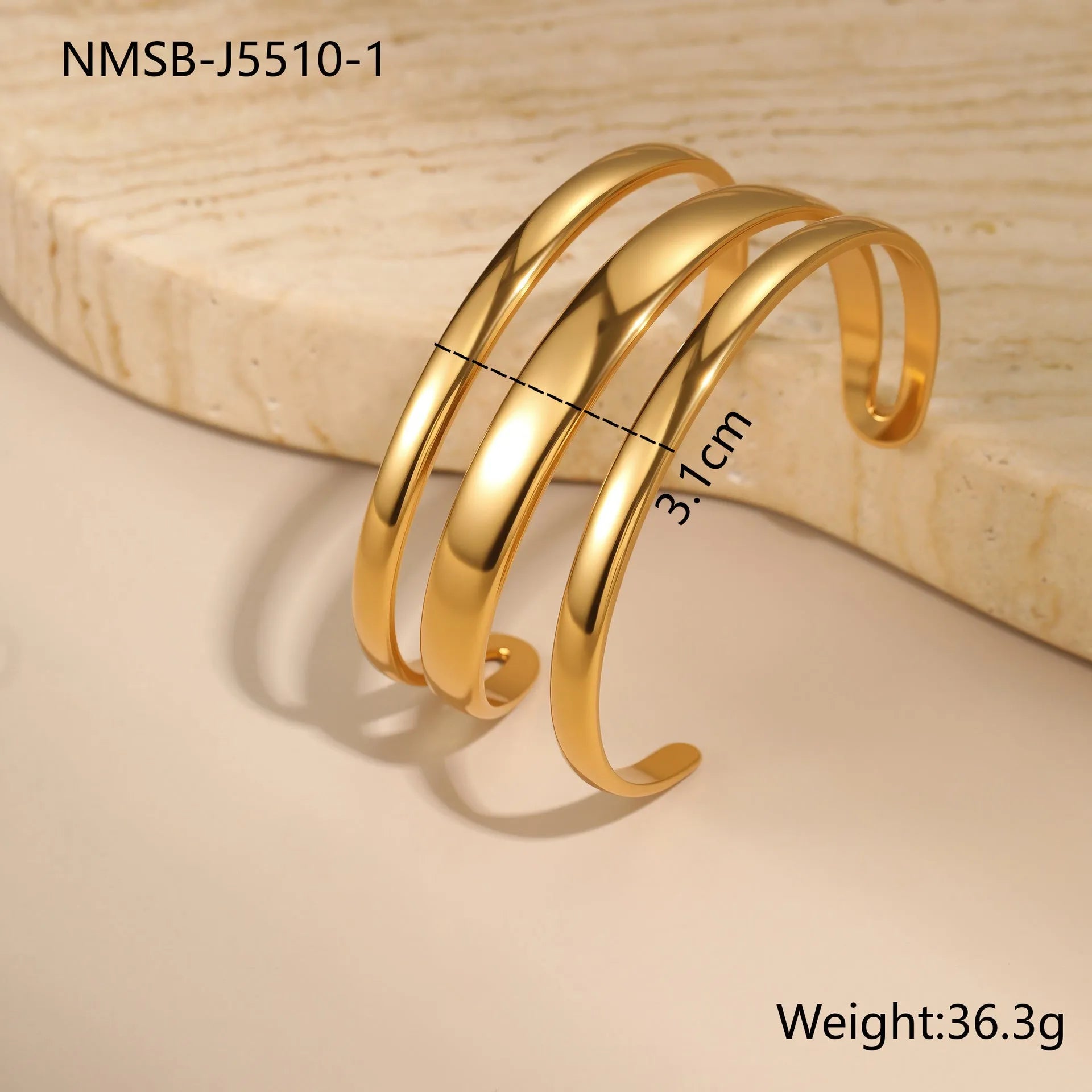 Gold and steel colour geometric line design stainless steel bracelet for women with simple opening clasp.