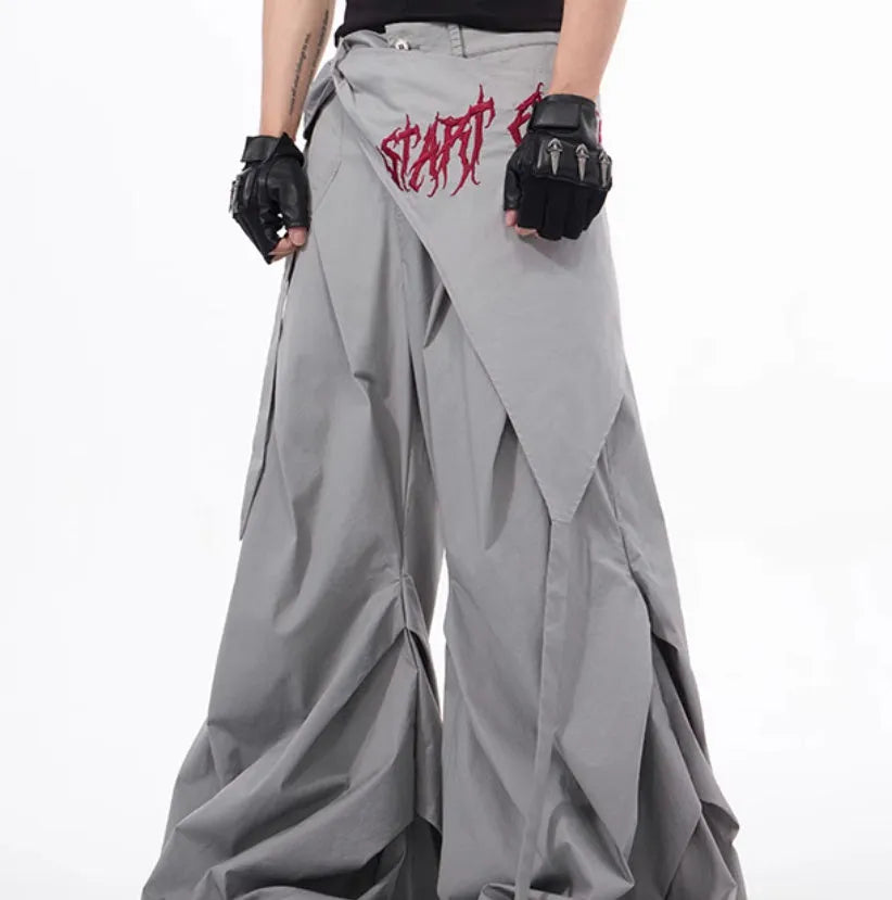 Boy's wide-leg summer pants in Korean style, shown in black and grey colour options.
