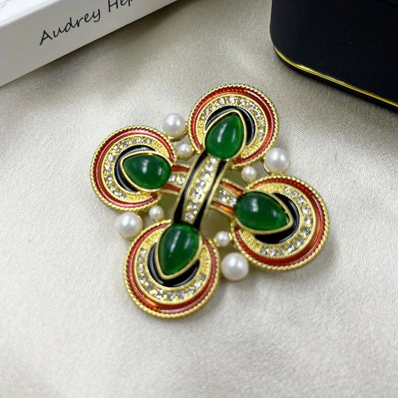 Medieval baroque crystal cross brooch in zinc alloy with ornate design on dark background