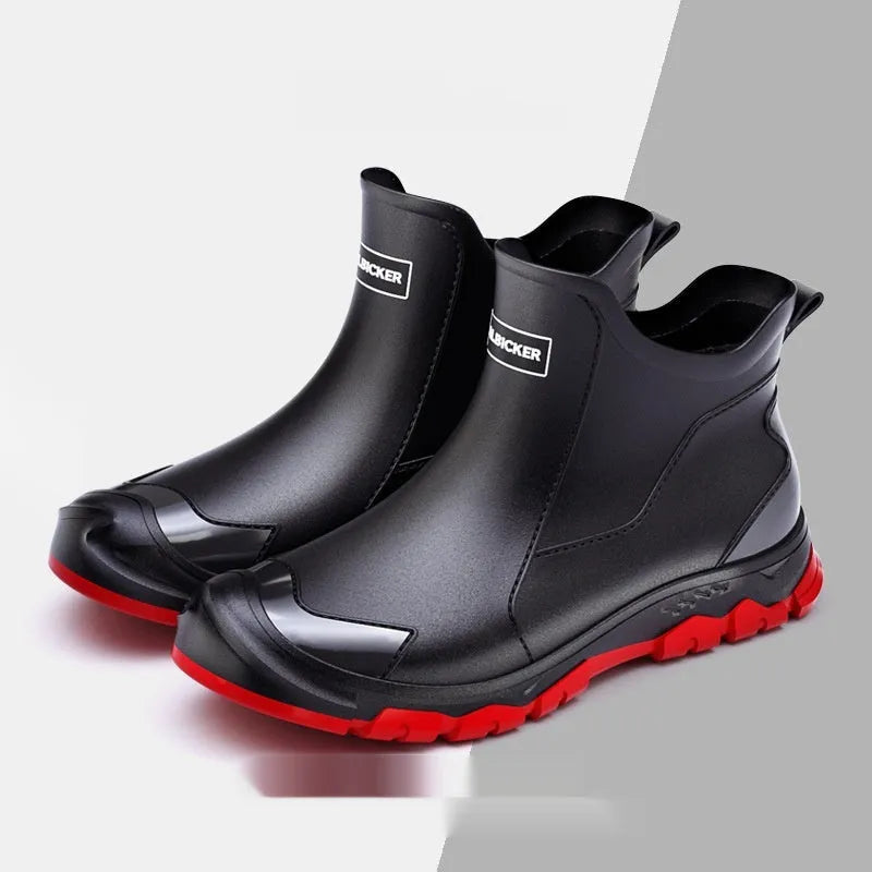 PVC outdoor wading boots in beige and black with red, showing round toe and non-slip plastic sole.
