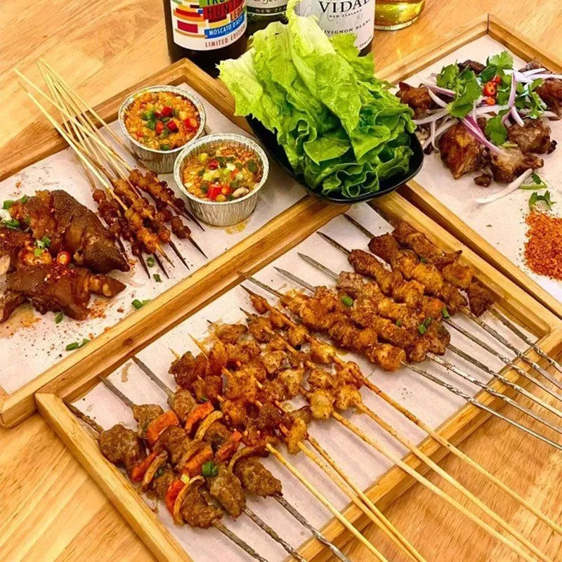 Square brown-handled bamboo serving tray on a table, pastoral style.