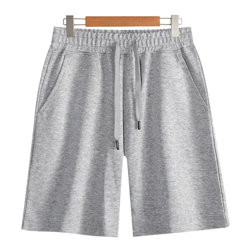 Straight-leg cotton sports shorts in light grey on a neutral background.