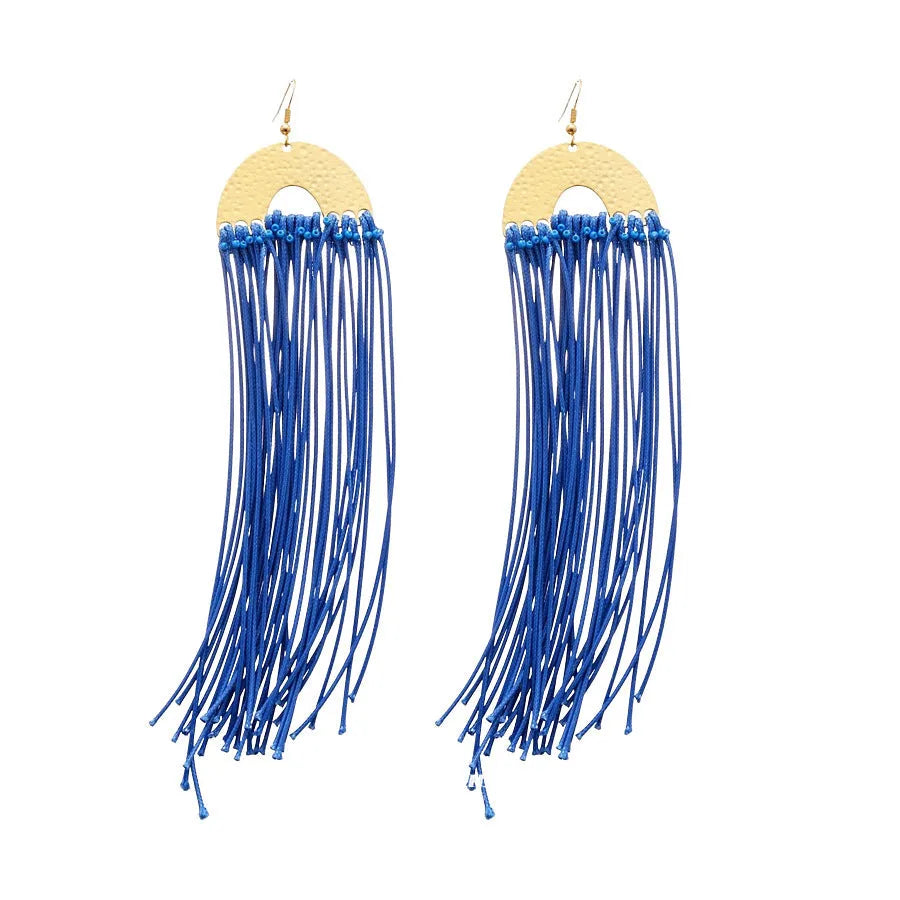 Geometric cloth earrings with blue resin flower detail and round design elements
