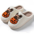 Halloween pumpkin house slippers in black with plush material and non-slip rubber soles
