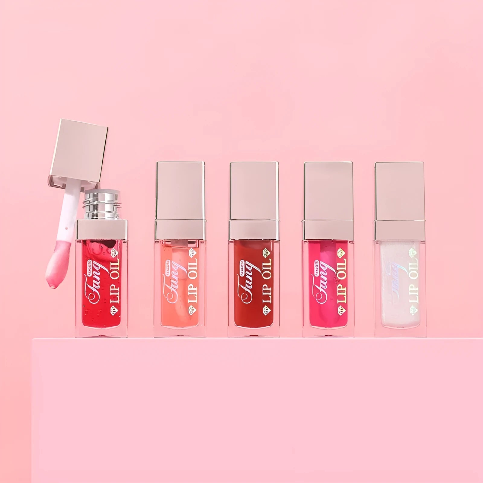 Five colour options of bright lip gloss mint lipstick with moisturising lip essence oil formula