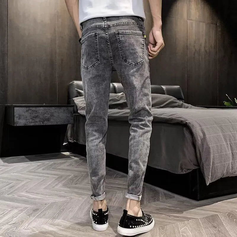 New Youth men's high-waist cotton denim trousers with high elasticity and button front, available in multiple sizes