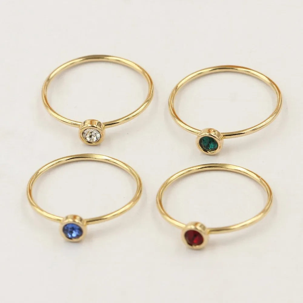 Women's 14K gilded zircon knuckle ring on copper body in green, blue, dark red or white