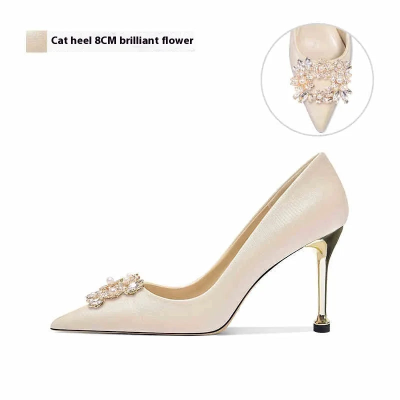 Crystal-embellished bridal high heels with pointed toe, available in stiletto or cat heel styles.