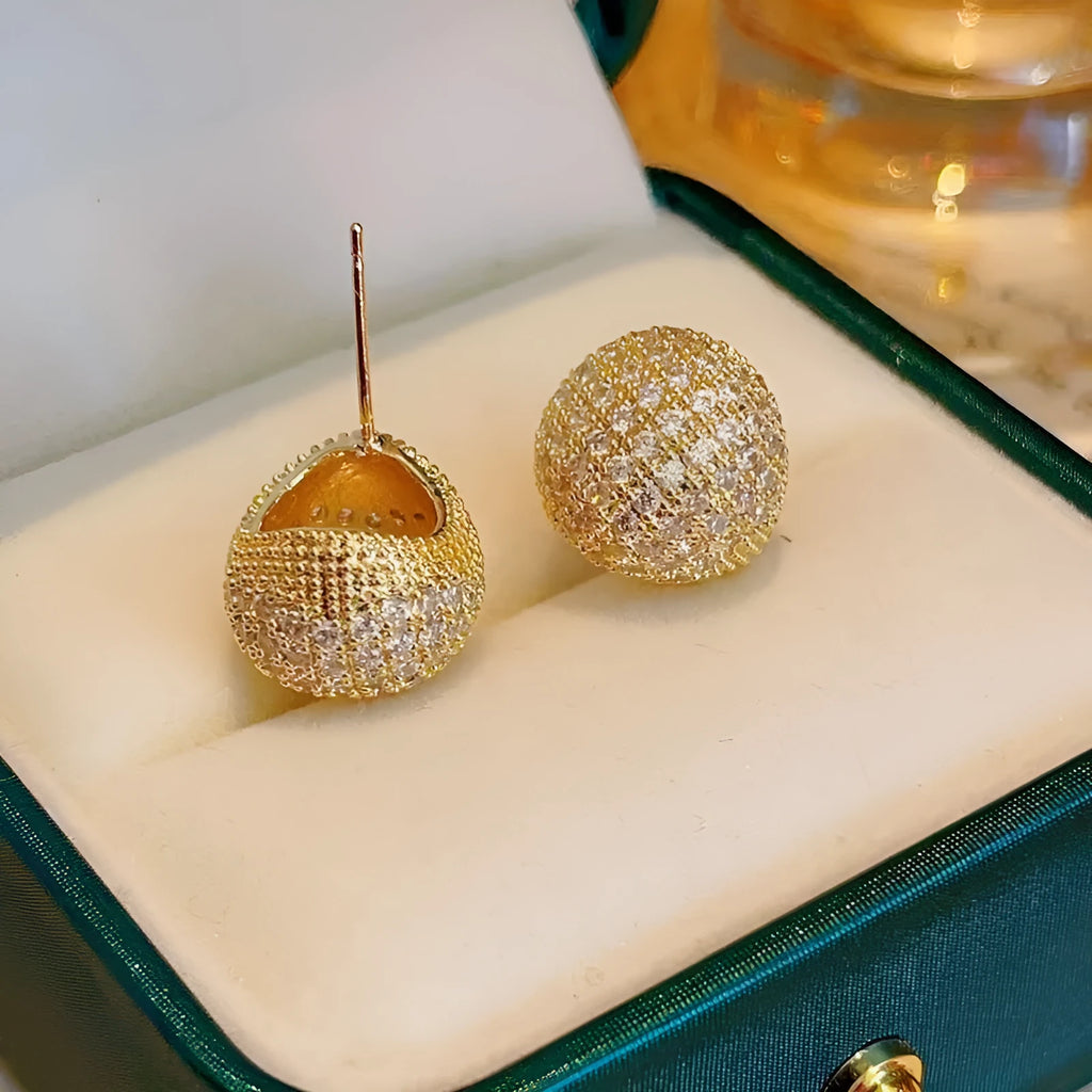 Little Golden Beans geometric drop earrings with full diamond-cut crystal surface and spherical elements