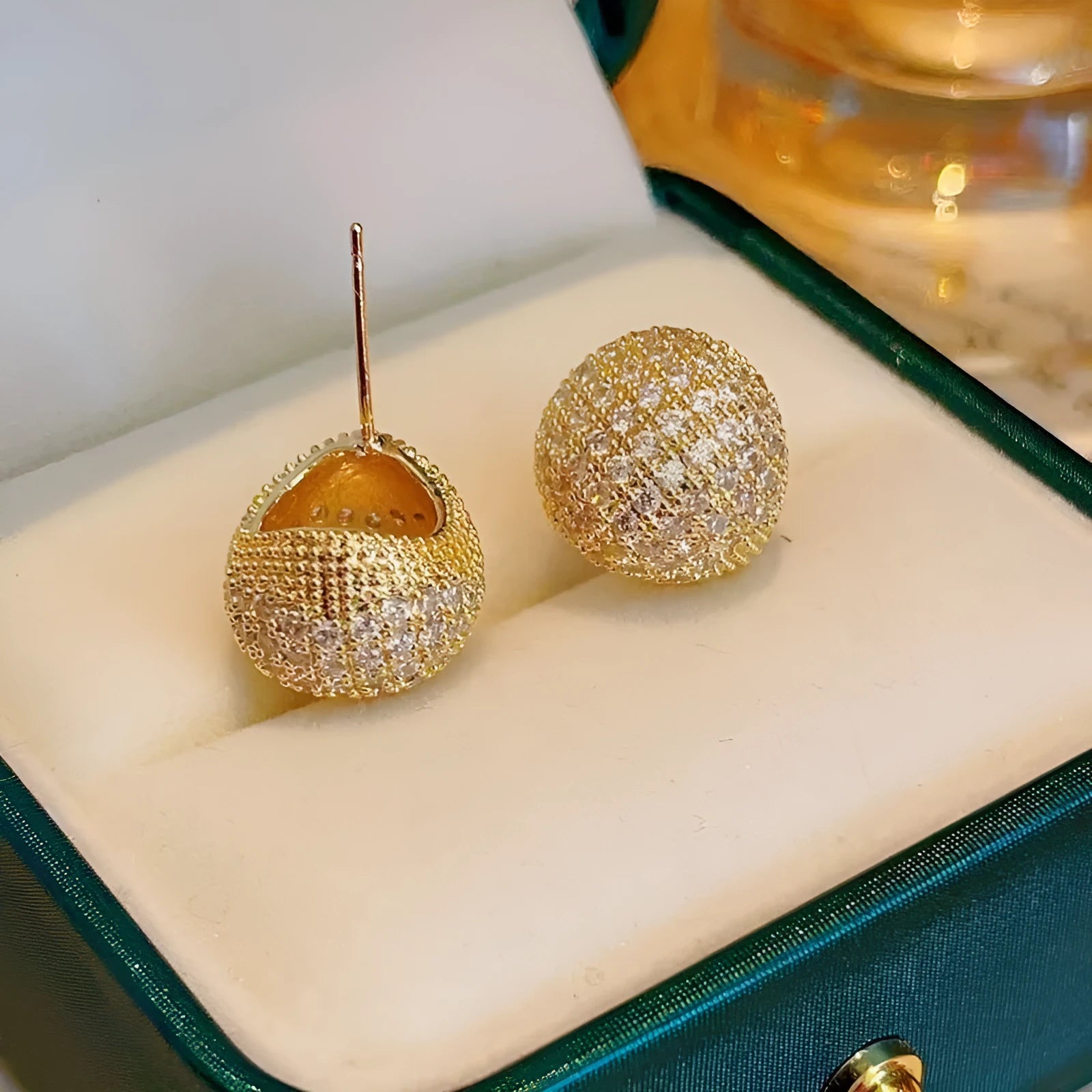 Little Golden Beans geometric drop earrings with full diamond-cut crystal surface and spherical elements
