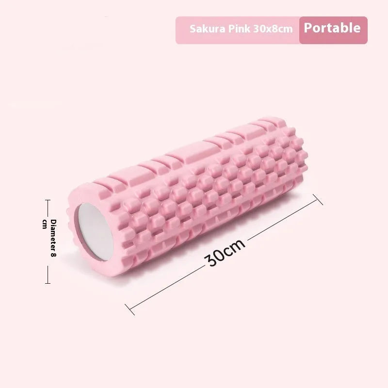 EVA foam roller for fitness in various colours and sizes on a gym floor.
