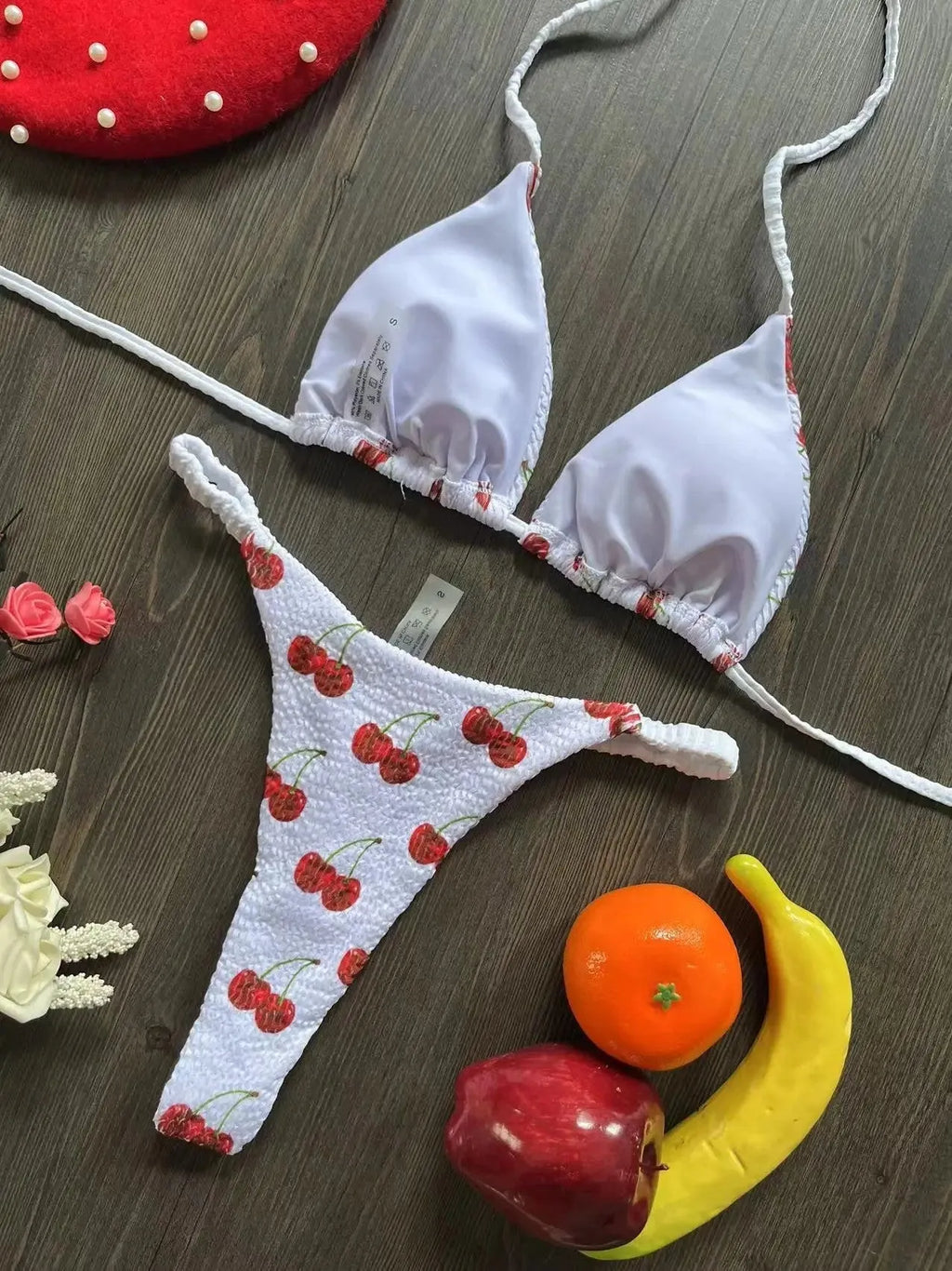 Women's printed bikini swimsuit with briefs style on a neutral background.