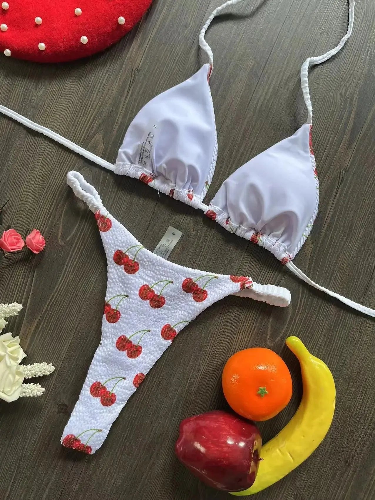 Women's printed bikini swimsuit with briefs style on a neutral background.