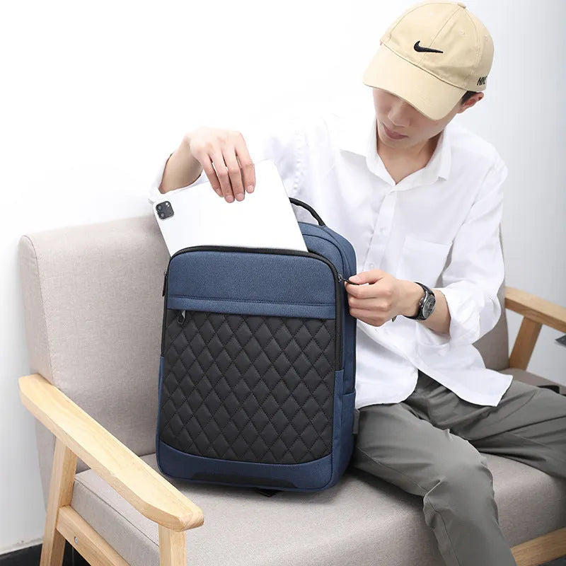 Men's Oxford cloth leisure travel backpack in black with curved shoulder strap and diamond mesh detail