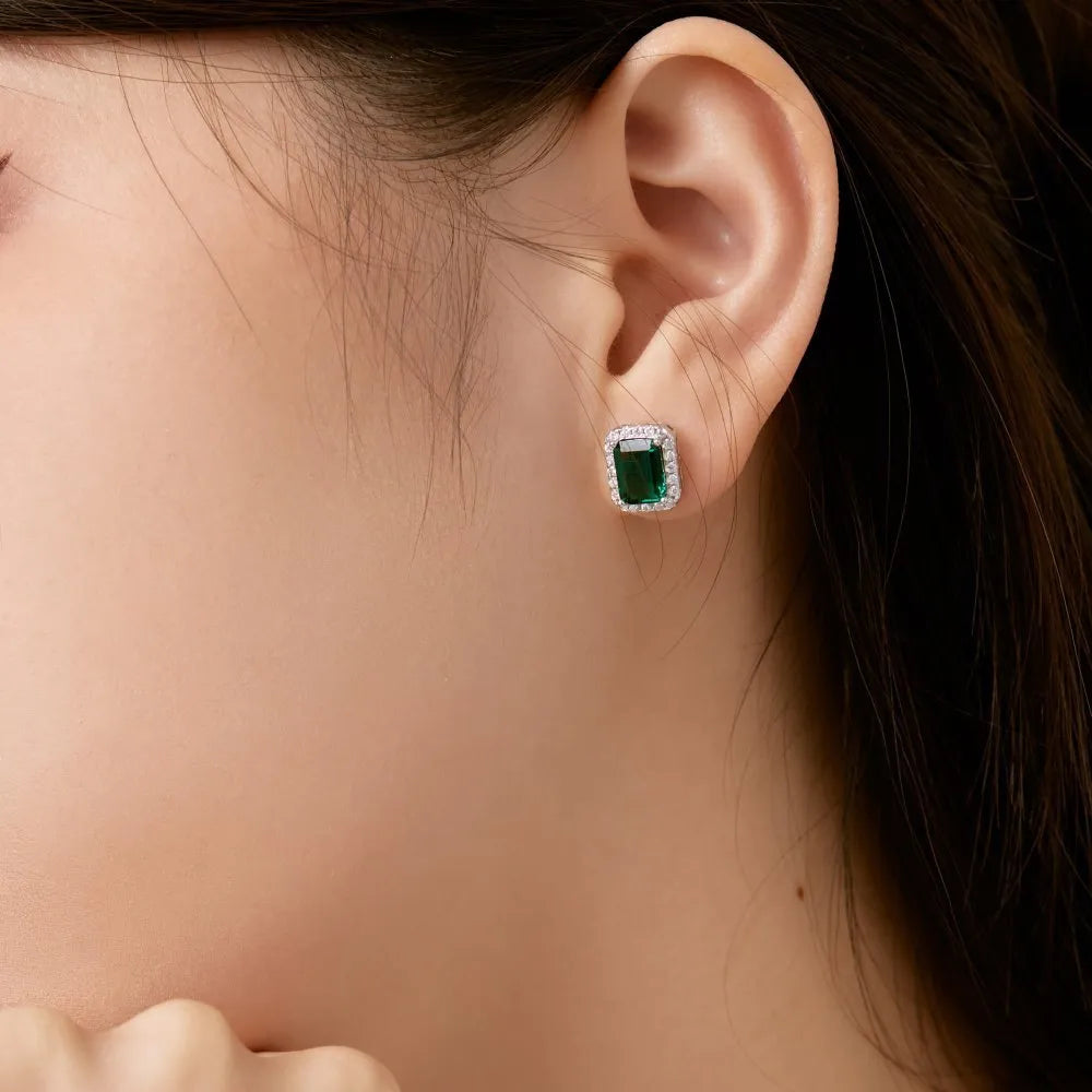 Diamond and emerald symmetry stud earrings in platinum 925 silver 8.5 x 10.5mm