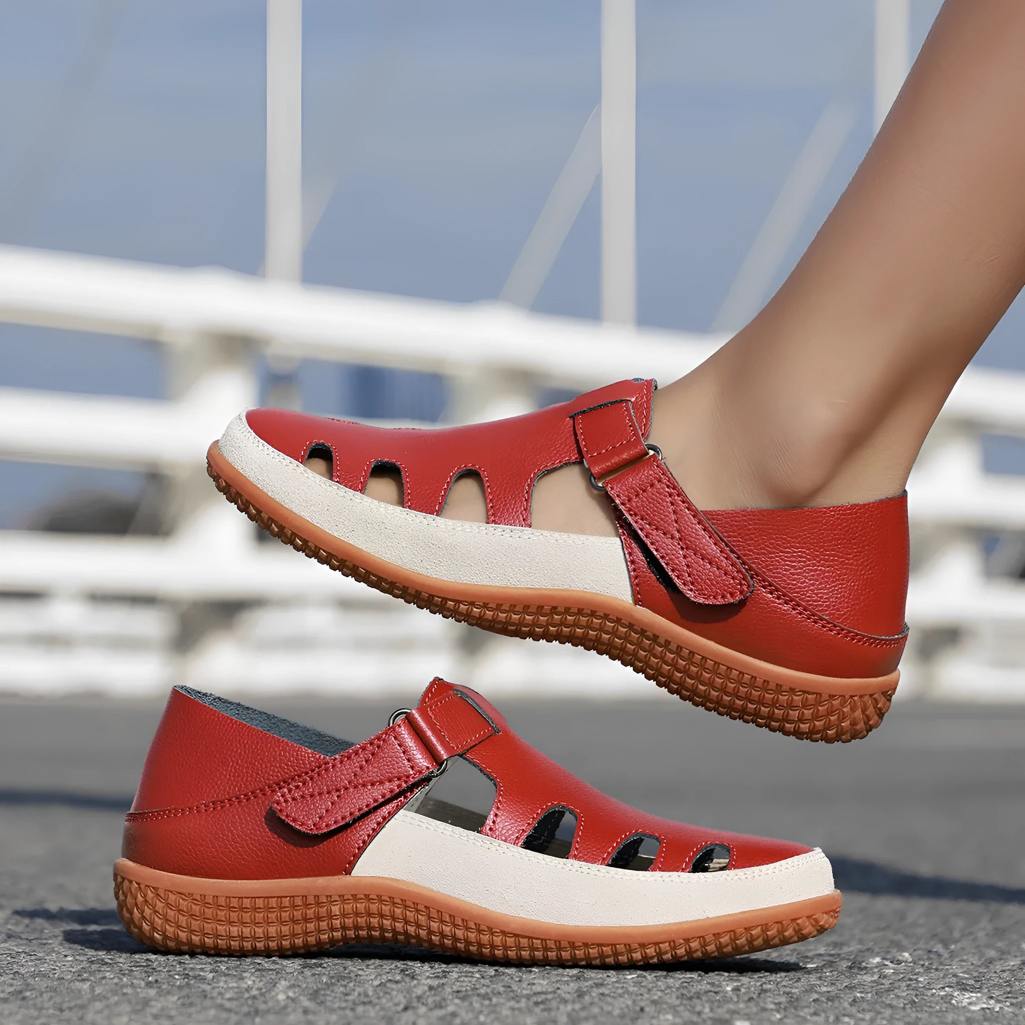 Women's plus size flat heel sandals with hollow toe cap in blue, red, or white on a thick rubber sole.