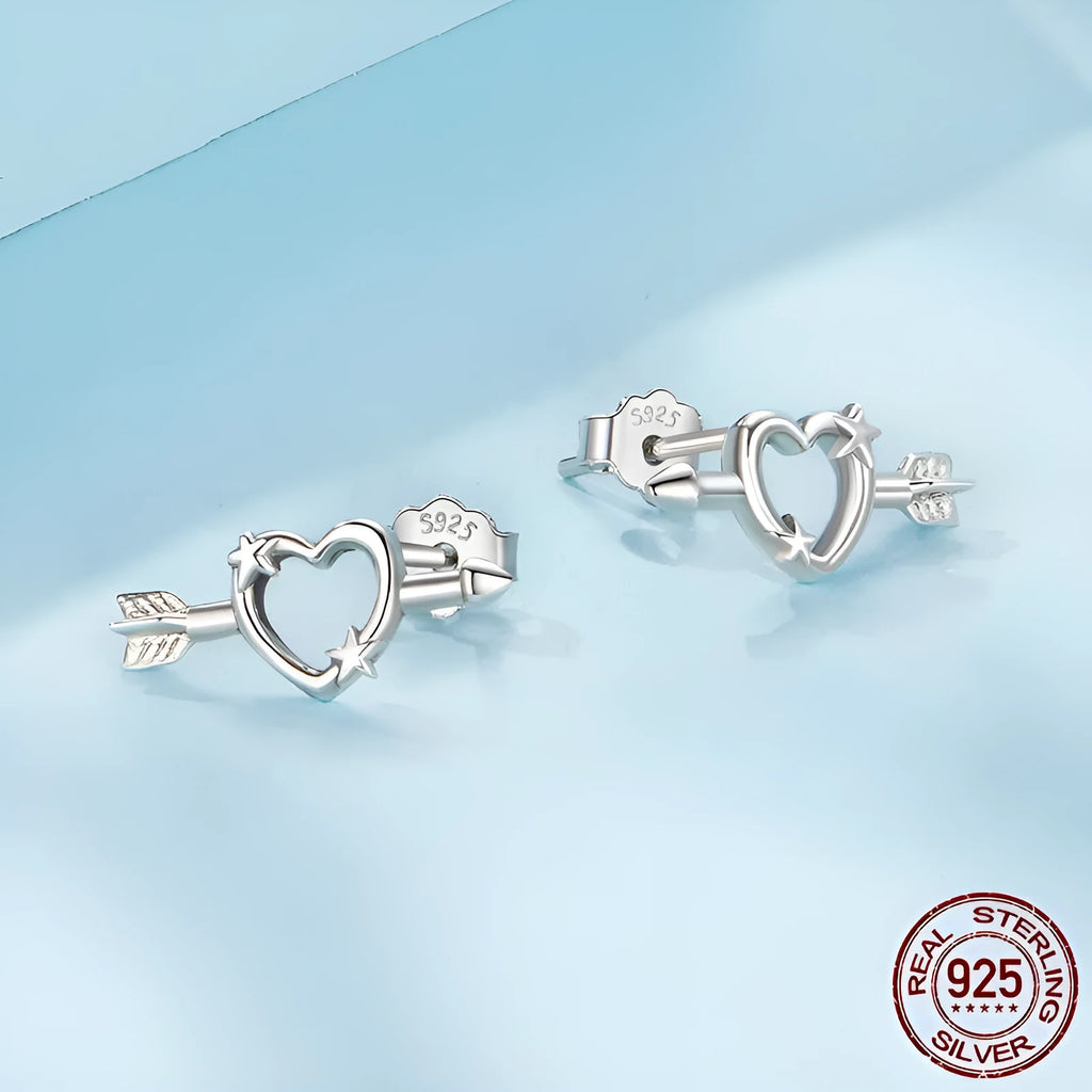 S925 sterling silver mini heart stud earrings with polished finish on white background