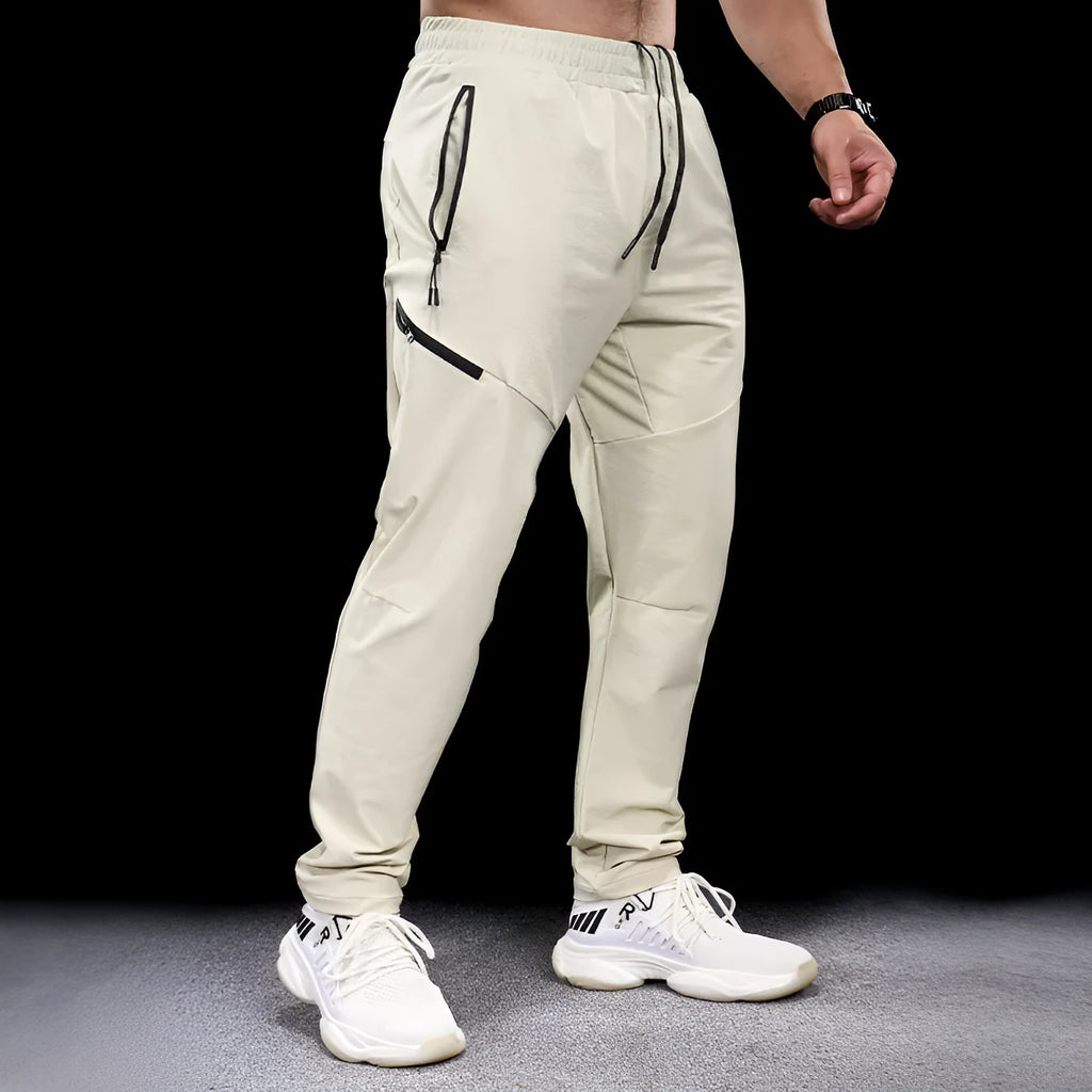 Men's waterproof quick-drying exercise pants in nylon fabric for sports and fitness