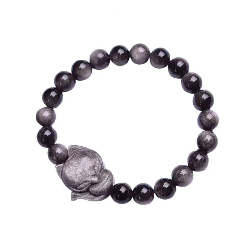 Obsidian fox charm bracelet on an adjustable leather cord for women.