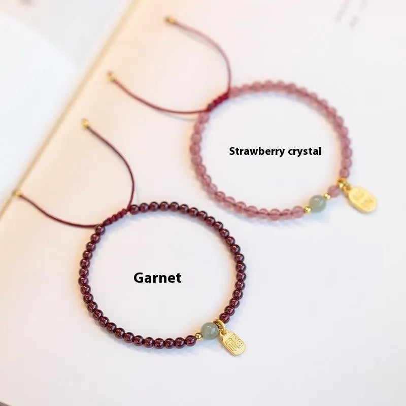 Hand-woven red rope bracelet with strawberry quartz crystals in minimalist national tide style