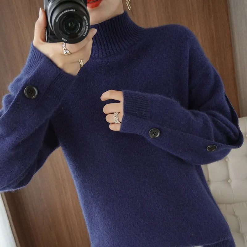 Women's solid colour acrylic knitted base layer top in brown, long sleeve crew neck style on a neutral background