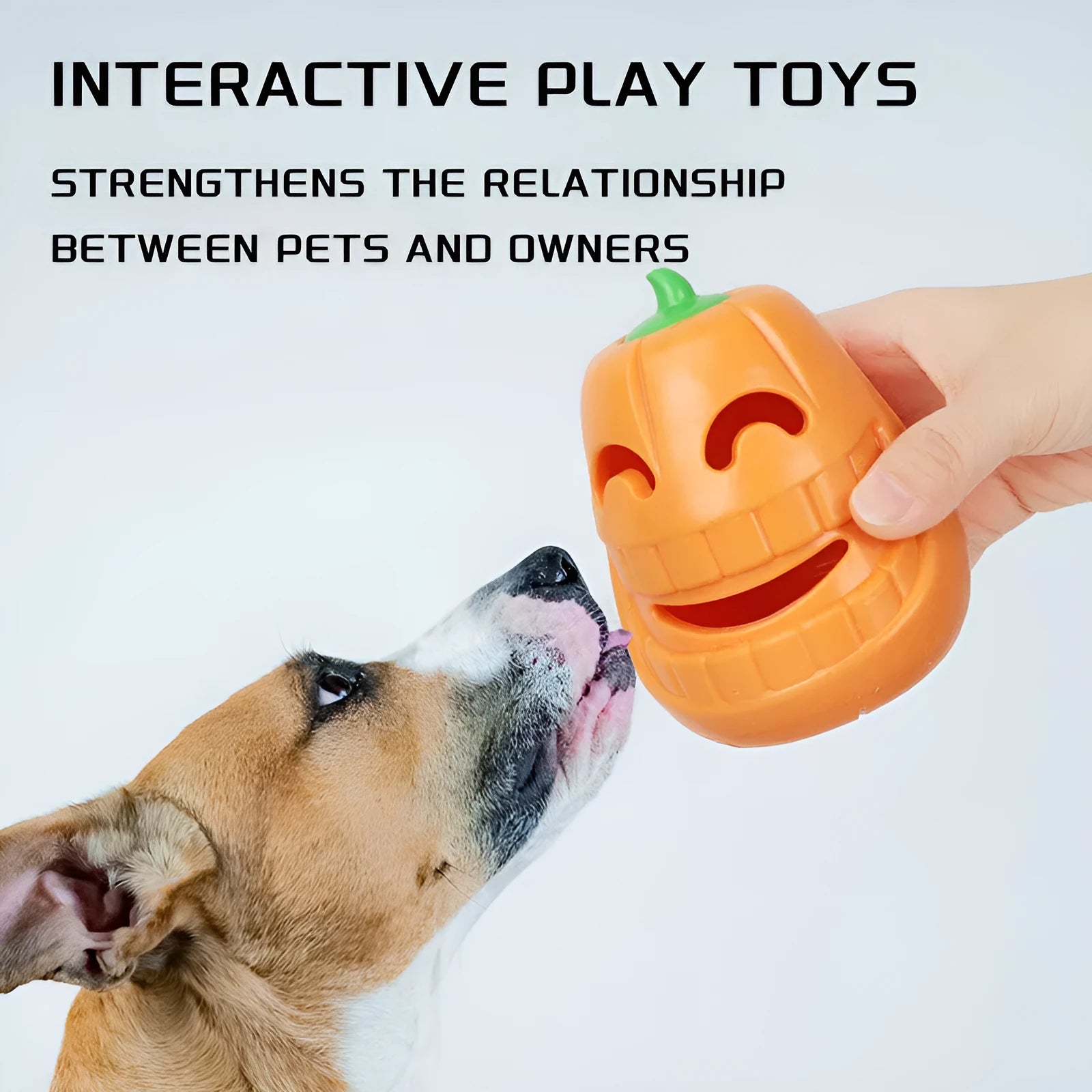 Orange Halloween pumpkin shaped dog chew toy with a treat-dispensing funnel hole