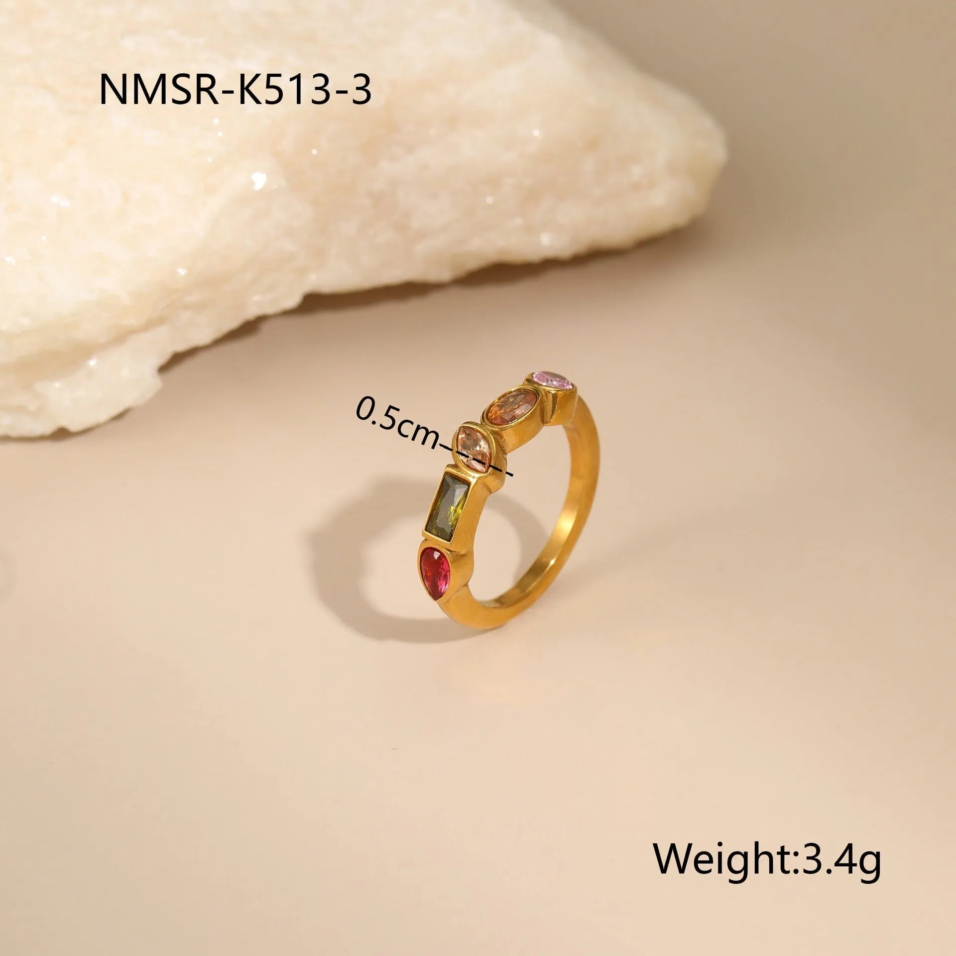 Geometric gold plated jewellery set showing necklace, ring, and earrings with chain design elements