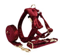 Fabric dog collar and lead set with bow, flowers, vest, and poop bag in blue, green, and wine red colours