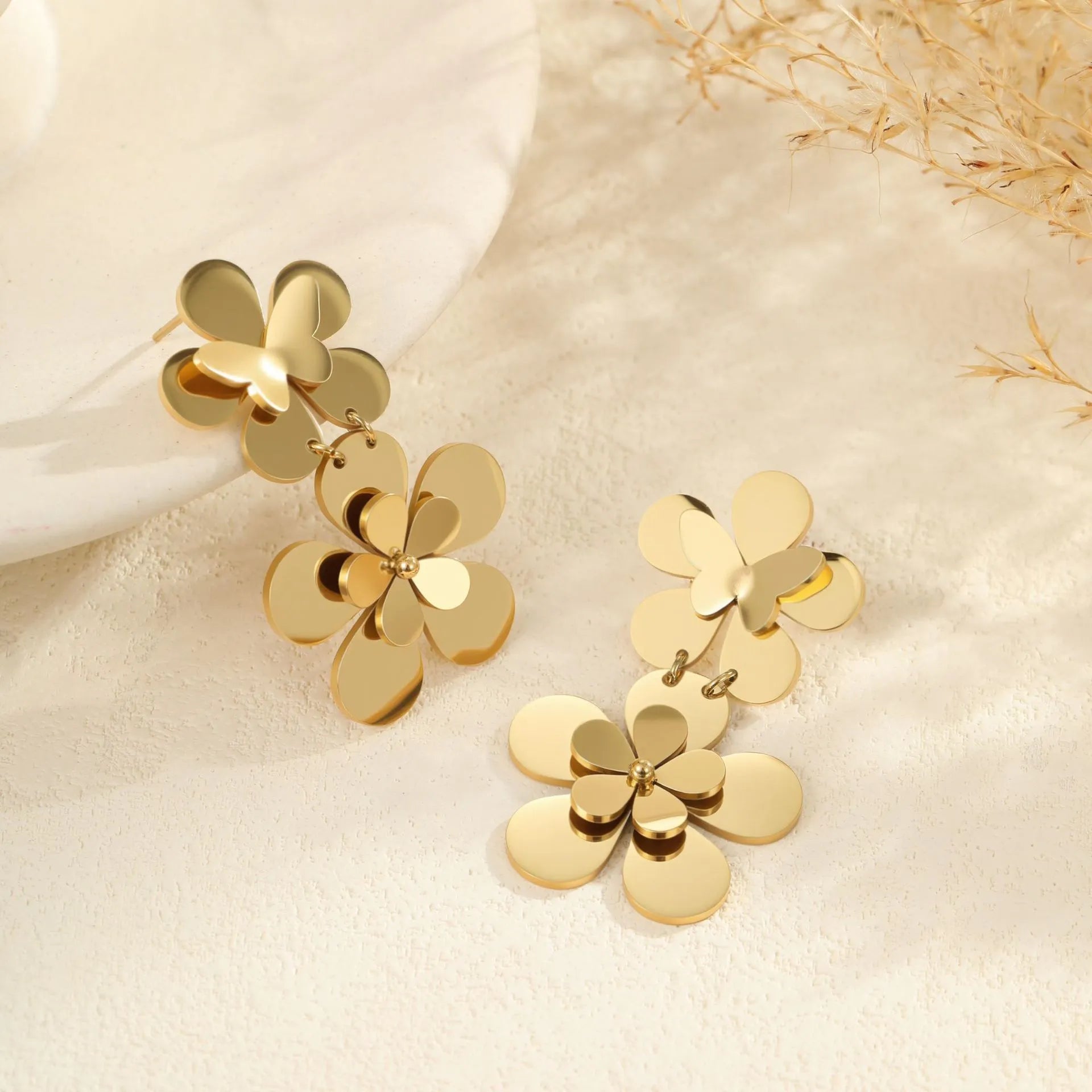 Gold electroplated butterfly flower earrings for women with stainless steel construction and animal zodiac styling