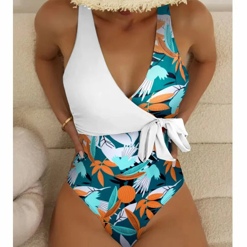 Women's high-waist one-piece swimsuit with an all-over printed pattern in a conservative style.