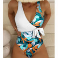 Women's high-waist one-piece swimsuit with an all-over printed pattern in a conservative style.