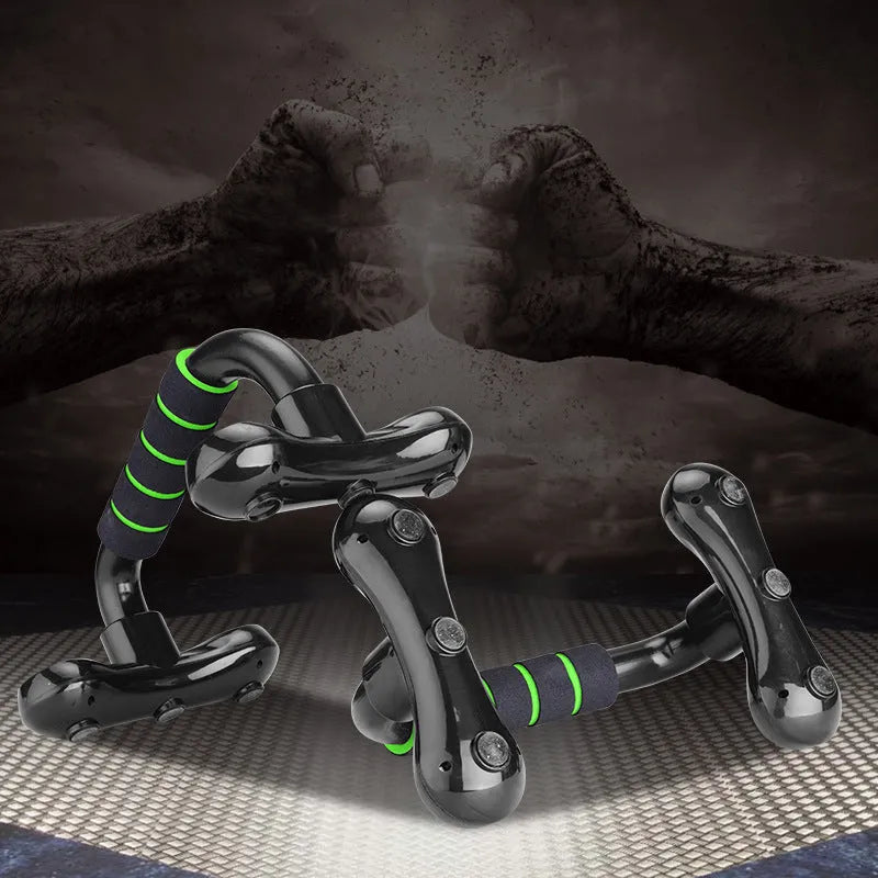 Multifunctional I-shaped detachable push up bars with black fruit green foam grip on a home gym floor