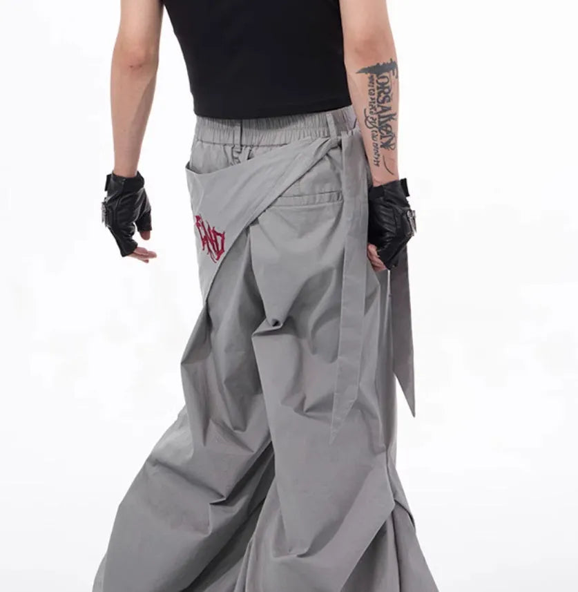 Boy's wide-leg summer pants in Korean style, shown in black and grey colour options.