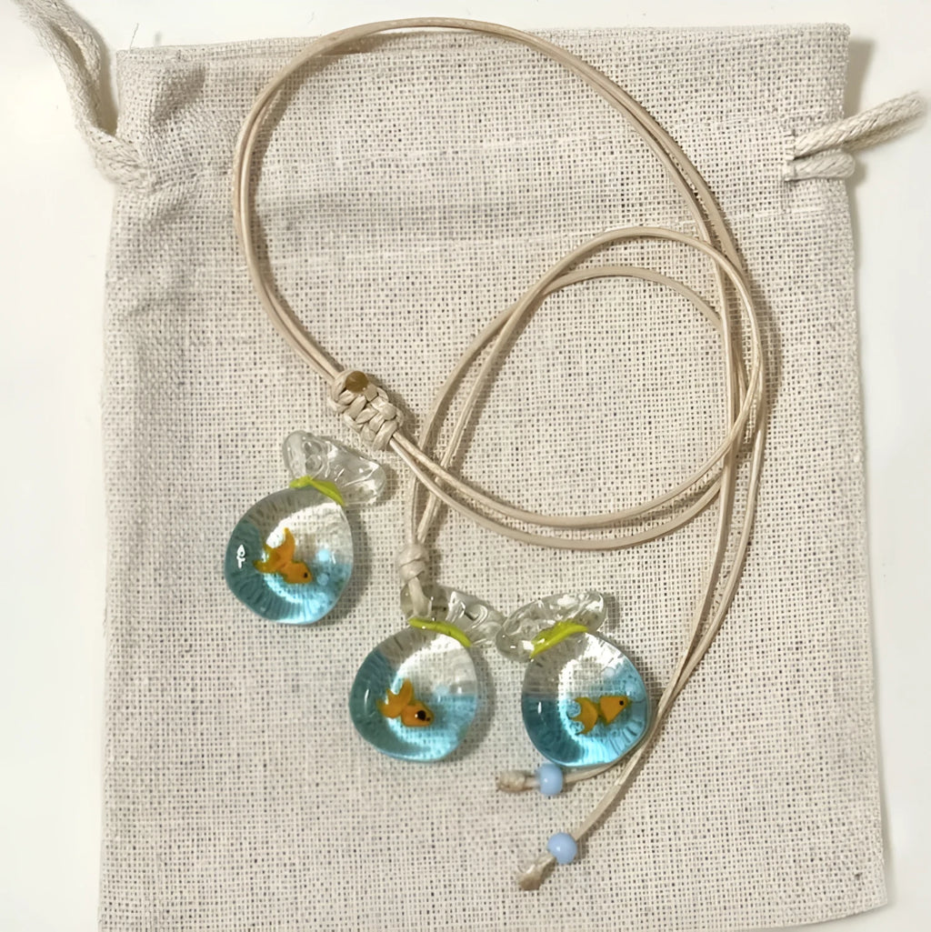 Women's necklace with coloured glaze joker skirt pendant on a cotton linen clavicle chain