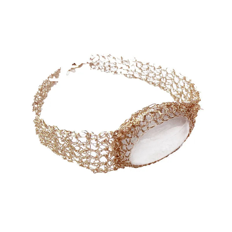 14k gold wire natural white chalcedony bracelet on wrist with adjustable chain closure