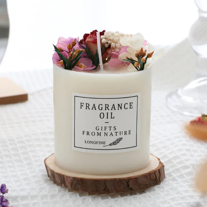 Aromatherapy candle with dried flowers decoration showing approximately 330g size and optional wood chip base