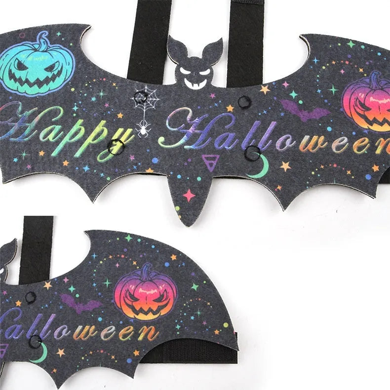 Black felt batwing Halloween costume for a cat, shown in pumpkin bat design