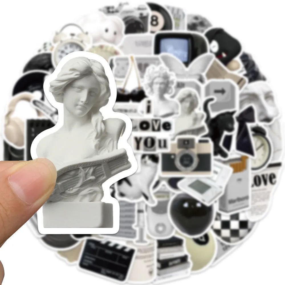 61 black and white PVC waterproof stickers for laptops, phones, luggage, and skateboards.