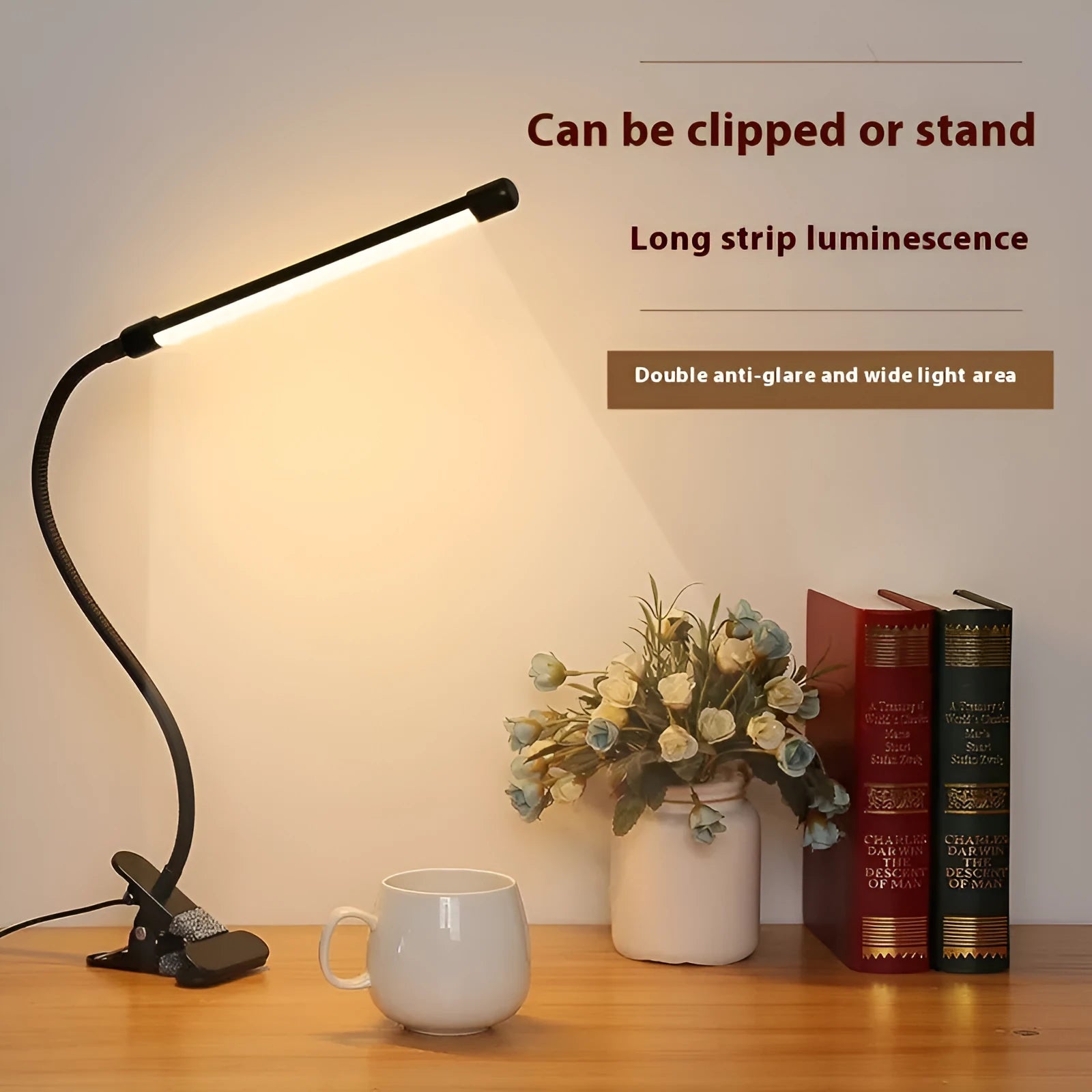 Black and white LED desk lamp with USB cable, 26cm length, for desk use.