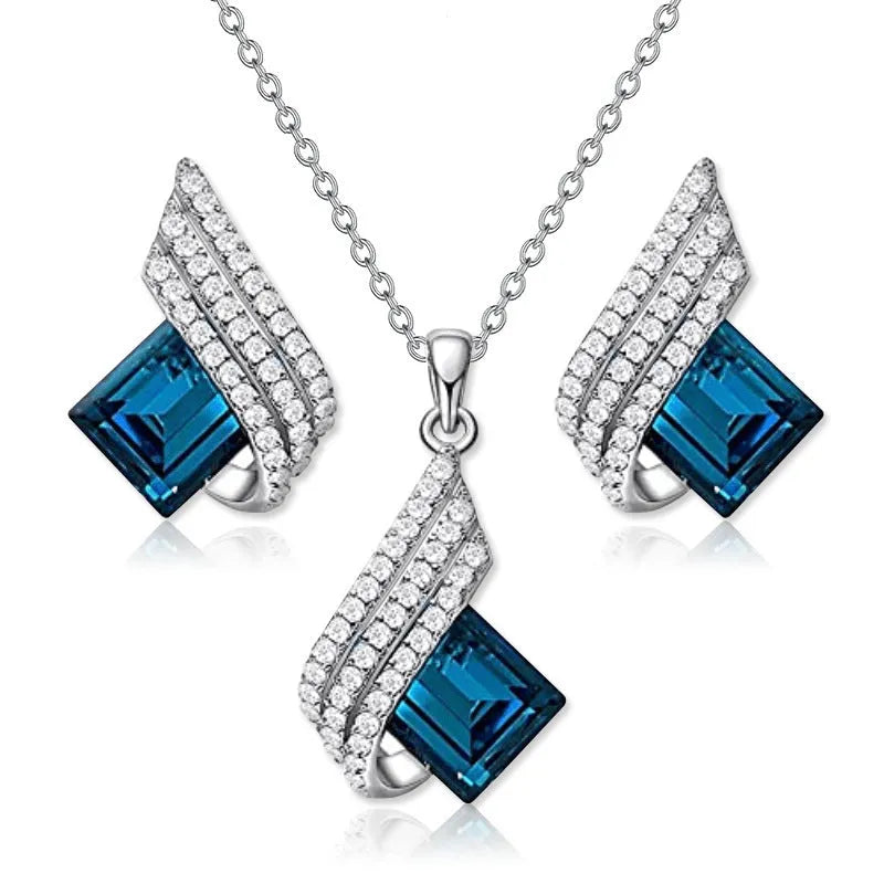 Women's alloy and glass necklace with matching ear stud set featuring cross chain design