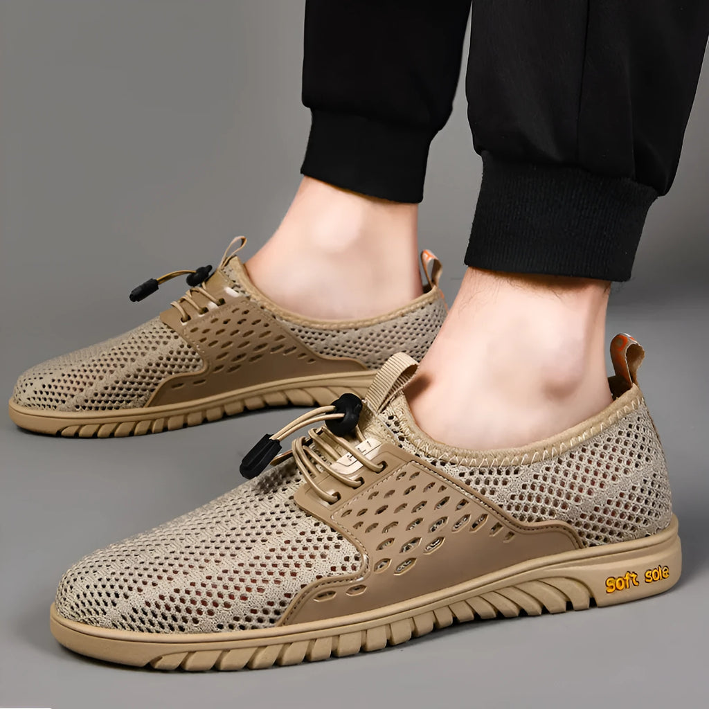 Men's grey mesh casual slip-on shoes with elastic band and rubber sole.