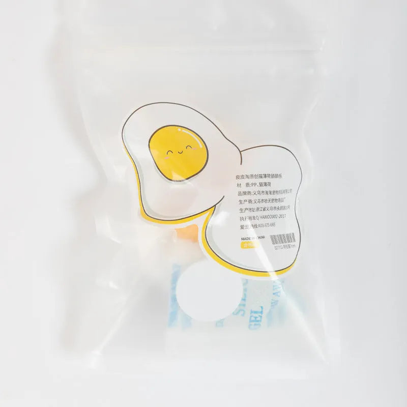 Soft plush catnip ball toy in fried egg shape for wall play with cats