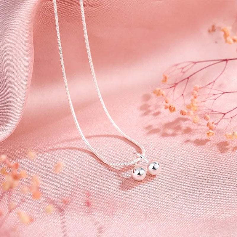 Adjustable silver cherry necklace with snake bone chain and fruit pendant