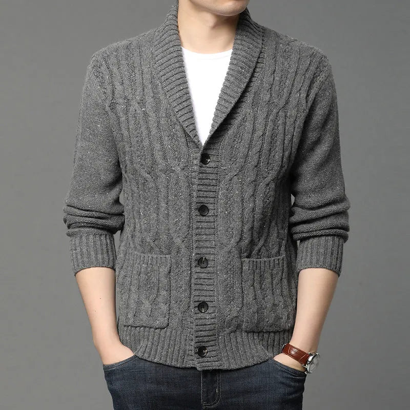 Man wearing a dark grey Korean style jacquard knitted cardigan jacket with a straight cut.