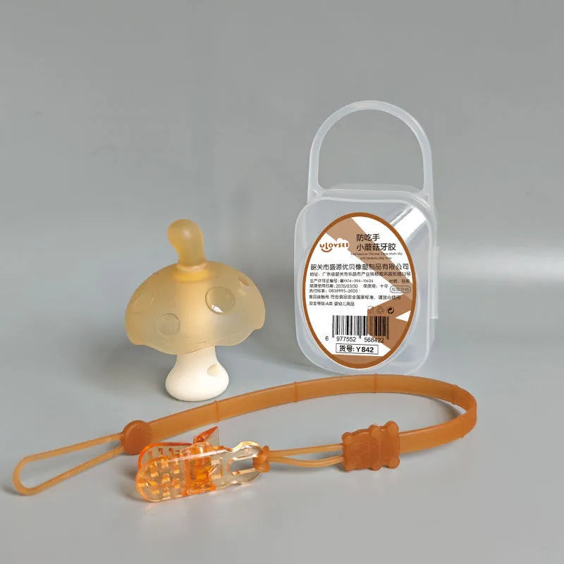Small latex mushroom gum silicone toy in a transparent box with a chain.