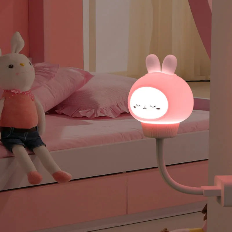 Cartoon animal USB night light with adjustable brightness on bedside table