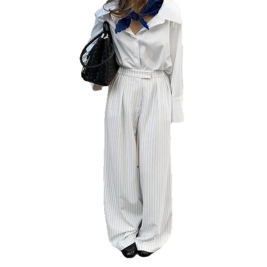 White striped wide-leg commuting pants with loose casual fit and zipper closure