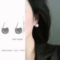 Little Golden Beans geometric drop earrings with full diamond-cut crystal surface and spherical elements